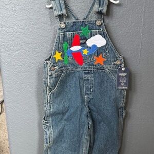 Vintage OshKosh B'gosh Kids Denim Overalls with embroidered planes 2T